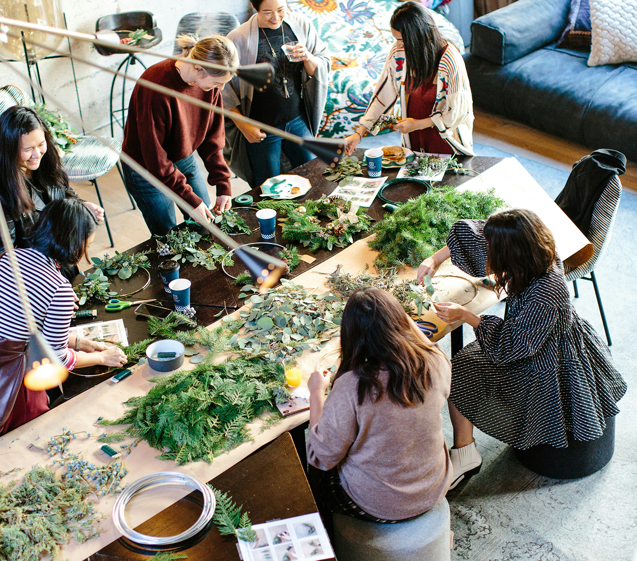 women working with leaves